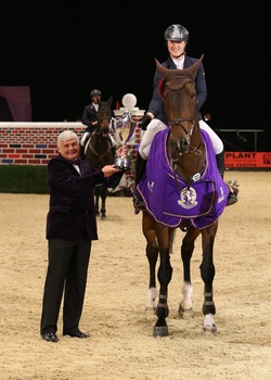 An incredible win for Holly Smith in the Thistledown Puissance at Horse of the Year Show